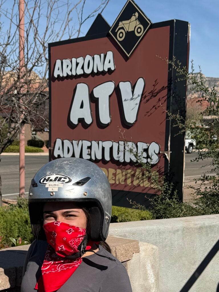 First-time rider on an ATV tour Sedona with red rock views